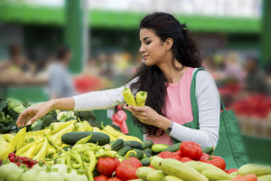 woman buying vegetables on the market