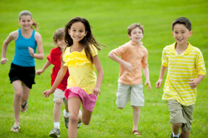 A group of diverse children playing outside.