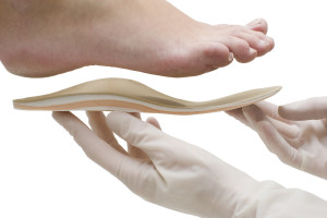 Doctor adapts insole to foot shape