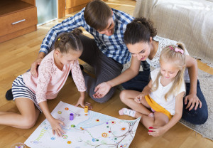 Family playing at board game