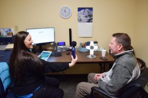 Steve Breitwieser works with Riverview Health speech pathologist Carah Sullenbarger to improve his vocal loudness and articulation. 