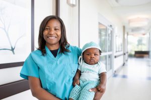  Riverview Health Physicians OB/GYN Valerie Gathers, MD, is the proud mother of a three-year-old son and a new baby girl, Mackenzie (pictured above). As a working mother, Dr. Gathers understands the stress her patients may be feeling when they return to work.