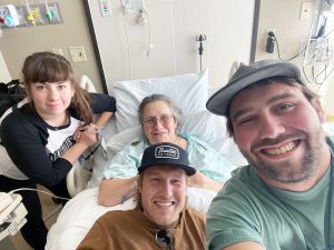 Laurie’s three children visited her while she was recovering in the Riverview Health ICU